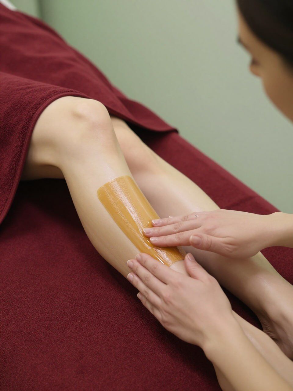 Professional waxing treatment at Gilded Dreams Salon